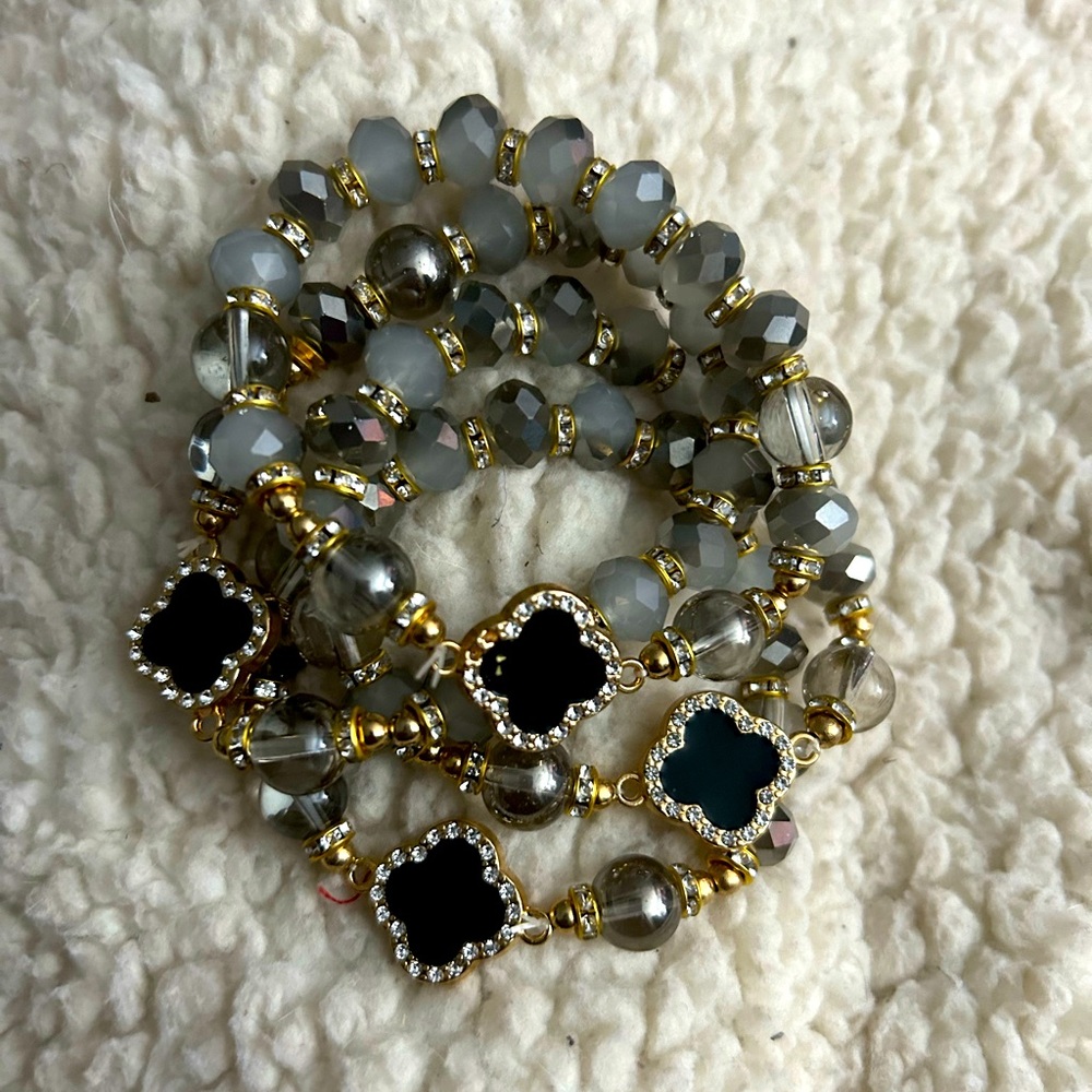 4 piece clover stretchy bracelets, new
